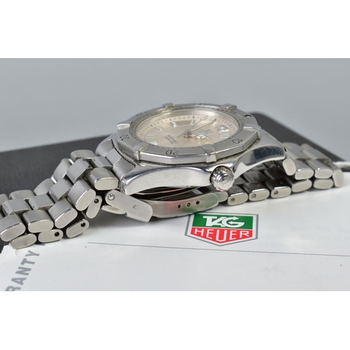 152 - A TAG HEUER 2000 SERIES AUTOMATIC WRISTWATCH, with a circular silver face and baton markers, date wi... 