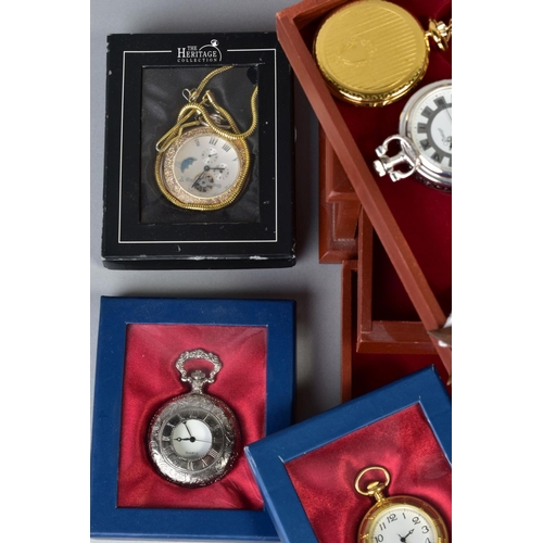 160 - A SELECTION OF POCKET WATCHES, to include six boxed quartz movement watches, a wooden storage displa... 