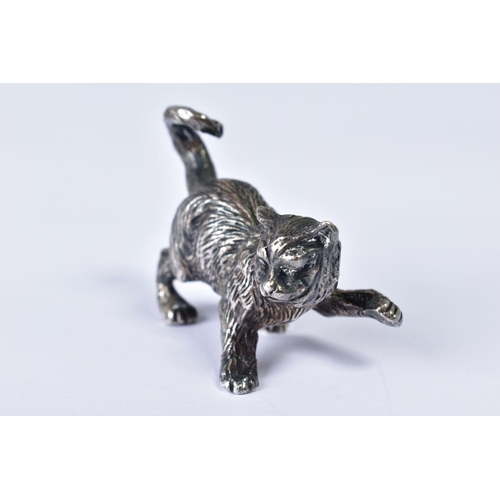 161 - A VINTAGE SILVER PLATED MODEL OF A CAT, cast in a pouncing stance with tail curled up, height 3.5cm