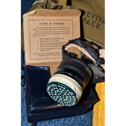 164 - A BOX CONTAINING MILITARY KIT/SURVIVAL BAGS BRITISH/US, together with two British issue WWII style/e... 