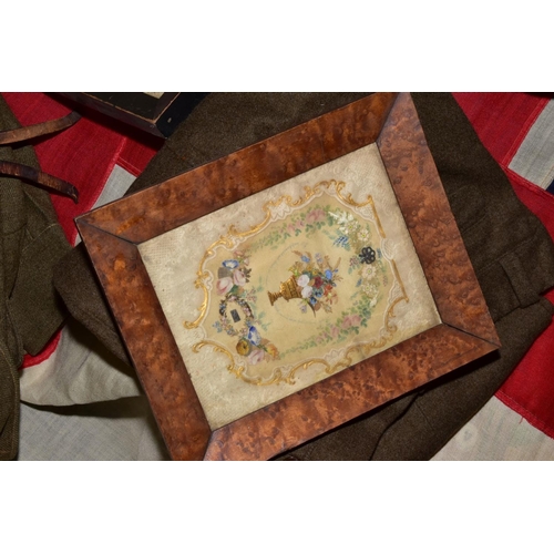 167 - A BOX CONTAINING VARIOUS BRITISH WWWI/II ITEMS including jacket and trousers, WWI uniform jacket, a ... 