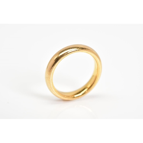 18 - A 22CT GOLD WEDDING RING, plain polished band, with a 22ct hallmark for Birmingham, ring size J1/2, ... 