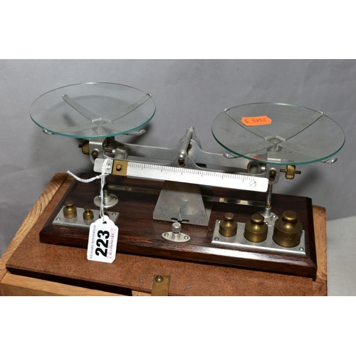 223 - A SET OF BALANCE SCALES, unmarked, complete with weights, in home made wooden case, with a cased Sig... 