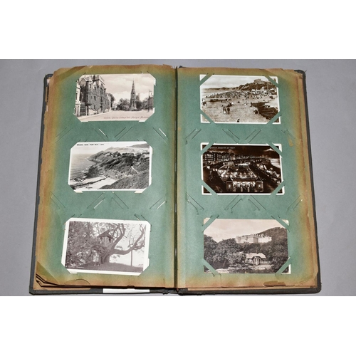 232 - A COLLECTION OF ONE HUNDRED AND SIXTY FIVE POSTCARDS in an old album, the cards are mainly of a topo... 