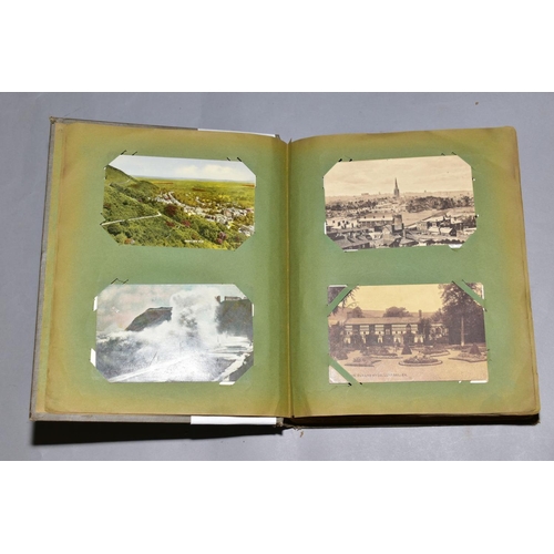 234 - AN EARLY 20TH CENTURY POSTCARD ALBUM, containing approximately two hundred and thirty vintage postca... 