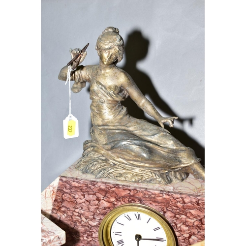 237 - A ROUGE AND BEIGE MARBLE CLOCK GARNITURE WITH RECLINING LADY ABOVE, together with a rouge and yellow... 