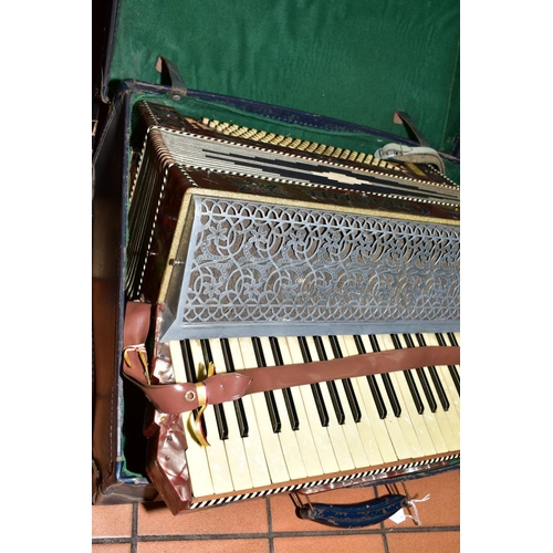 254 - A CARSINI ACCORDIAN, having one hundred and twenty bass keys and forty one treble keys, marble effec... 