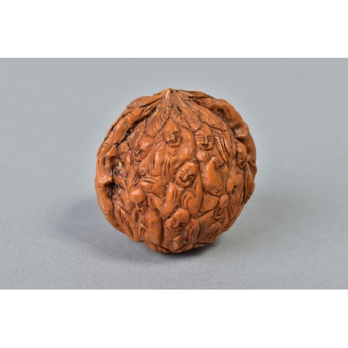 32 - A JAPANESE MEIJI PERIOD CARVED WALNUT, (circa 1868-1912) finely carved with immortal figures, height... 