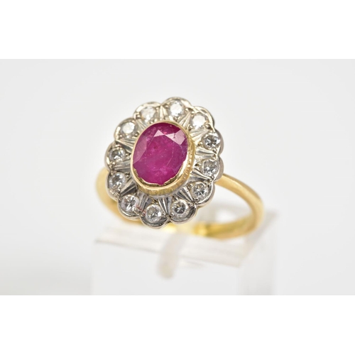 39 - AN 18CT GOLD CLUSTER RING, set with a central oval ruby with a round brilliant cut diamond surround,... 