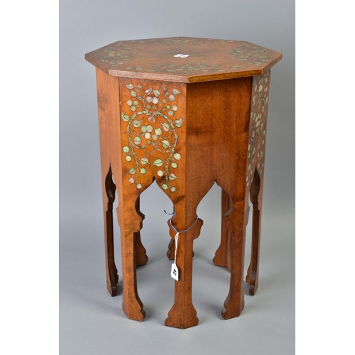 42 - AN ARTS AND CRAFTS LIBERTY STYLE MOORISH OCCASIONAL TABLE, the octagonal top and box painted with sc... 