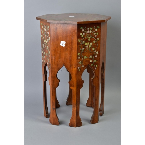 42 - AN ARTS AND CRAFTS LIBERTY STYLE MOORISH OCCASIONAL TABLE, the octagonal top and box painted with sc... 