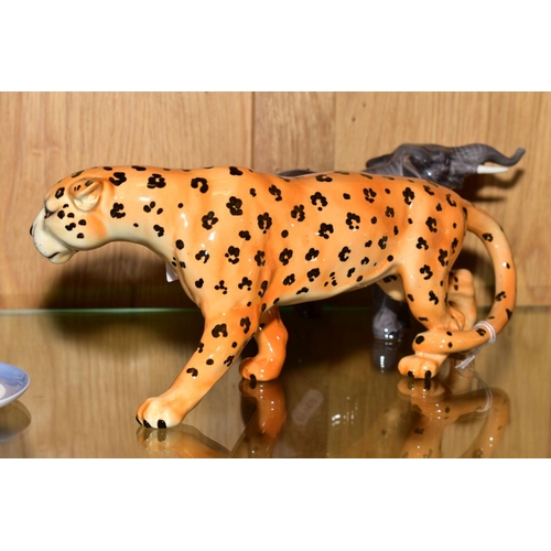 502 - A BESWICK LEOPARD IN PROWLING STANCE, length 31cm x height 12cm, gloss, model No.1082, with a Beswic... 