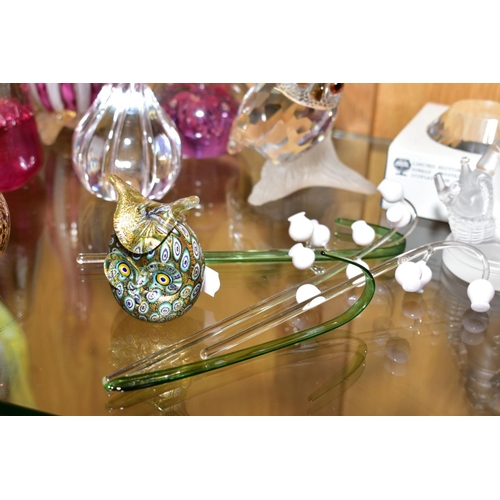 505 - A GROUP OF GLASS PAPERWEIGHTS AND FLOWERS, including Langham glass bird, indistinctly signed, length... 