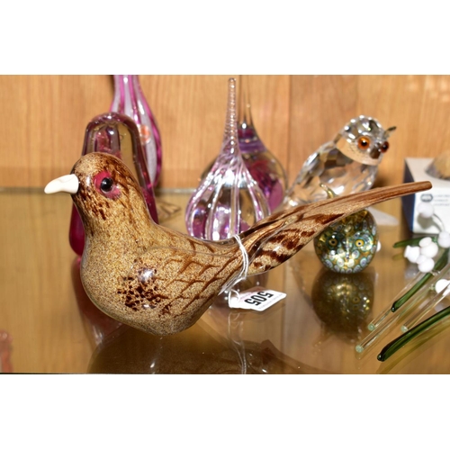 505 - A GROUP OF GLASS PAPERWEIGHTS AND FLOWERS, including Langham glass bird, indistinctly signed, length... 