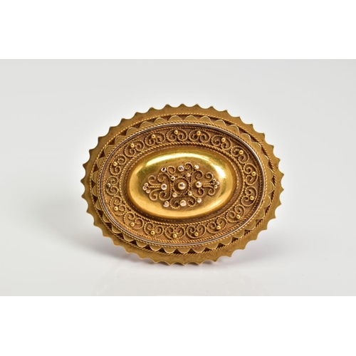 56 - AN EARLY 20TH CENTURY BROOCH, an oval  memorial brooch with filigree detail and scallop edge, photo ... 