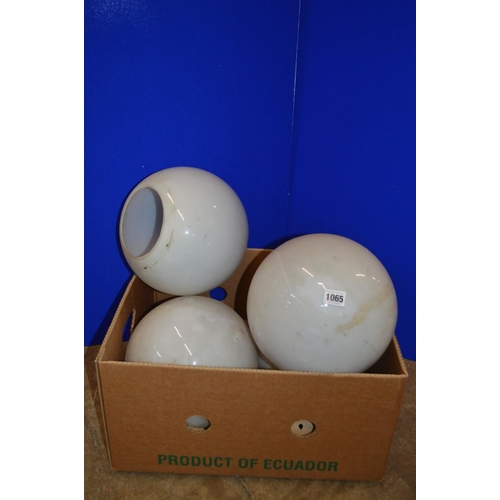 1065 - A BOX CONTAINING FOUR OPAQUE WHITE GLASS SPHERICAL CEILING LIGHT FITTINGS, approximate diameter 30cm... 