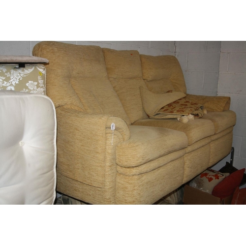 1100 - A BEIGE UPHOLSTERED THREE SEATER SETTEE, width 192cm