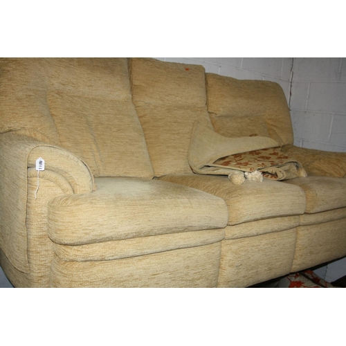 1100 - A BEIGE UPHOLSTERED THREE SEATER SETTEE, width 192cm