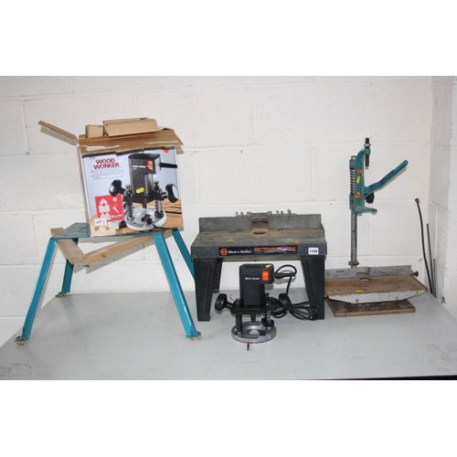 1104 - A BLACK AND DECKER BD66 ROUTER, a Black and Decker router table, another metal tool stand and a dril... 