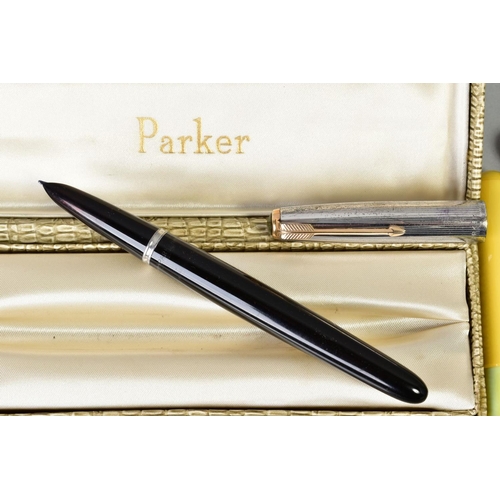 117 - A SELECTION OF ITEMS, to include four Parker fountain pens and Paper Mate, together with a rolled go... 