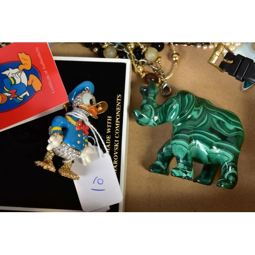 118 - A BOX OF ITEMS, to include an Italian micro mosaic brooch, a jewelled Donald duck figure, a carved m... 