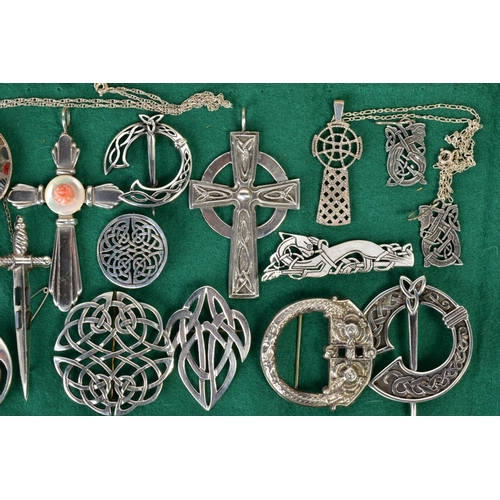 122 - A SELECTION OF ITEMS, to include a pair of Celtic drop earrings with fish hook fittings, twelve Celt... 