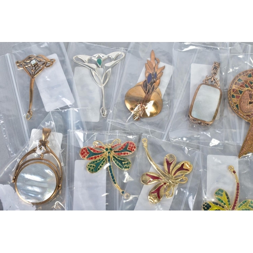 124 - A SELECTION OF JEWELLERY, to include four yellow metal brooches in forms such as butterflies and dra... 