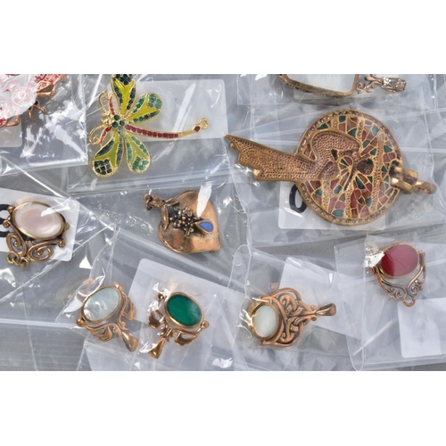 124 - A SELECTION OF JEWELLERY, to include four yellow metal brooches in forms such as butterflies and dra... 