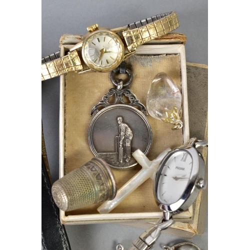 127 - A SELECTION OF JEWELLERY, to include a silver medallion pendant of a cricket player, with a Birmingh... 