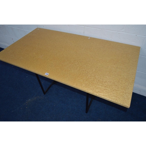 1309 - A MAPLE TOPPED RECTANGULAR DINING TABLE a crossed metal frame, width 140cm x depth 76cm x height 72c... 