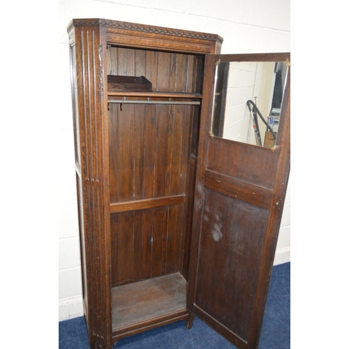 1312 - AN EARLY TO MID 20TH CENTURY OAK SINGLE DOOR HALL ROBE, with canted front corners, width 76cm x dept... 