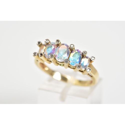 140 - A 9CT GOLD FIVE STONE RING, designed with five graduated oval cut mystic topaz (coated topaz), withi... 