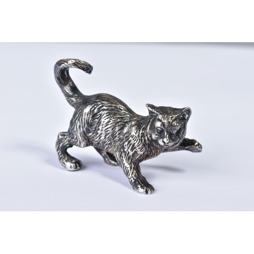 161 - A VINTAGE SILVER PLATED MODEL OF A CAT, cast in a pouncing stance with tail curled up, height 3.5cm