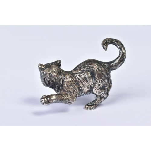 161 - A VINTAGE SILVER PLATED MODEL OF A CAT, cast in a pouncing stance with tail curled up, height 3.5cm