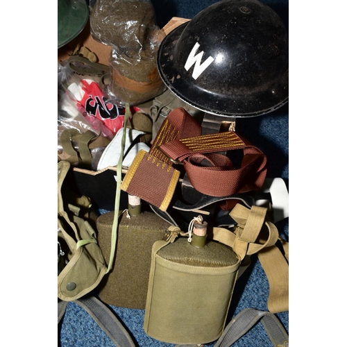 165 - A BOX CONTAINING VARIOUS MILITARY ITEMS AS FOLLOWS, three steel helmets (Air Raid Warden Black, Nati... 