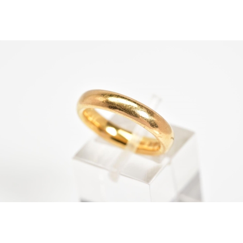 18 - A 22CT GOLD WEDDING RING, plain polished band, with a 22ct hallmark for Birmingham, ring size J1/2, ... 