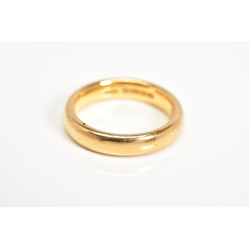 18 - A 22CT GOLD WEDDING RING, plain polished band, with a 22ct hallmark for Birmingham, ring size J1/2, ... 