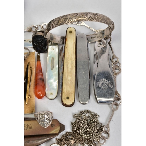 20 - A SELECTION OF ITEMS, to include a silver engraved bangle with safety clasp, various non pierced ear... 