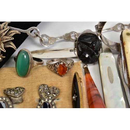 20 - A SELECTION OF ITEMS, to include a silver engraved bangle with safety clasp, various non pierced ear... 