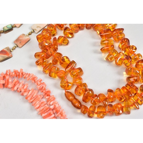 21 - A SELECTION OF NECKLACES, to include two modern amber bead necklaces, lengths 520mm - 670mm, a pink ... 