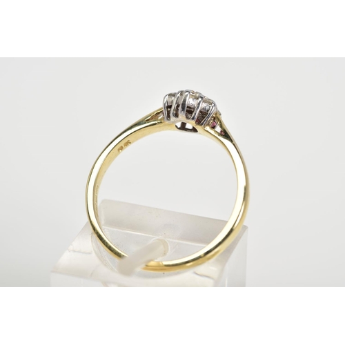 22 - A 9CT GOLD DIAMOND RING, designed as a cluster of round brilliant cut diamonds, to the tapered shoul... 