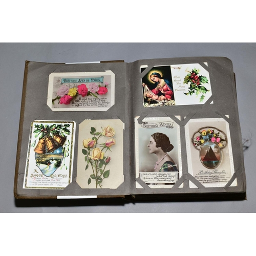 231 - A LARGE COLLECTION OF OVER FOUR HUNDRED AND SIXTY 'GREETINGS' TYPE POSTCARDS in a vintage album, the... 