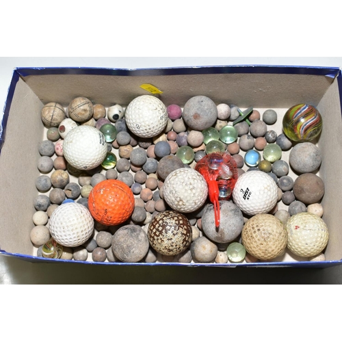 242 - A QUANTITY OF ASSORTED MARBLES, mainly stone with some glass examples and a number of golf balls