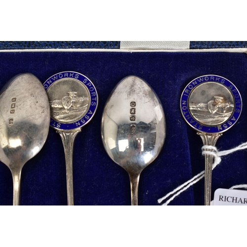 29 - A SET OF SIX SILVER TEASPOONS, each with a round blue enamel medal depicting a rifle men, to each ha... 