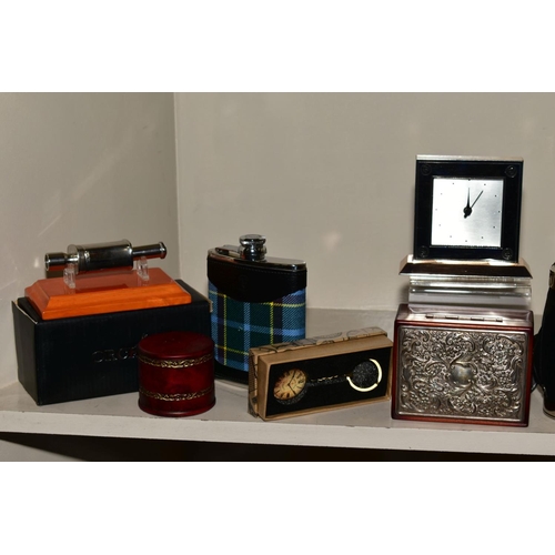 355 - NOVELTY ITEMS to include miniature clocks, key rings, hip flasks, leather goods, photograph frames, ... 