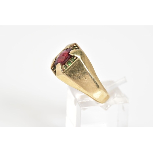 40 - A 9CT GOLD GENTLEMANS SIGNET RING, of square design set with a central oval cut garnet and green sto... 