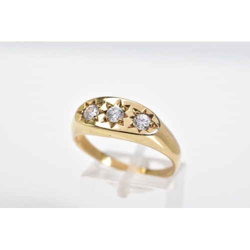 43 - A 9CT GOLD THREE STONE GYPSY RING, set with three round cut cubic zirconia stones, to a plain polish... 