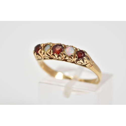 45 - A 9CT GOLD RING, designed as a row of three circular cut garnets interspaced by two circular opals a... 