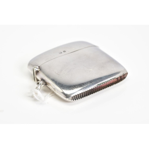 47 - AN EDWARDIAN SILVER RECTANGULAR VESTA CASE, hinged lid, plain bowed form, Birmingham 1907, 1.04ozt, ... 