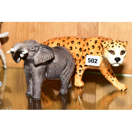 502 - A BESWICK LEOPARD IN PROWLING STANCE, length 31cm x height 12cm, gloss, model No.1082, with a Beswic... 